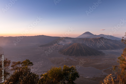 Mount Bromo volcano  Gunung Bromo  during colorful sunrise from viewpoint on Mount Penanjakan in Bromo Tengger Semeru National Park  East Java  Indonesia