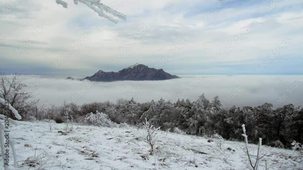 Time-lapse of cloud mass flow through a wide mountain valley Time-lapse of cloud mass flow through a wide mountain valley