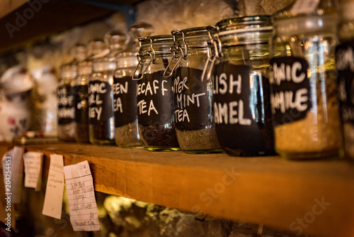 Fototapeta Naklejka Na Ścianę i Meble -  Tea and coffee jars on a shelf