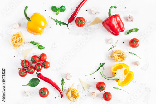 Fototapeta Naklejka Na Ścianę i Meble -  Ingredients for cooking pasta on white background. Fettuccine, fresh vegetables, cheese, mushrooms, spice. Italian food concept. Flat lay, top view, copy space