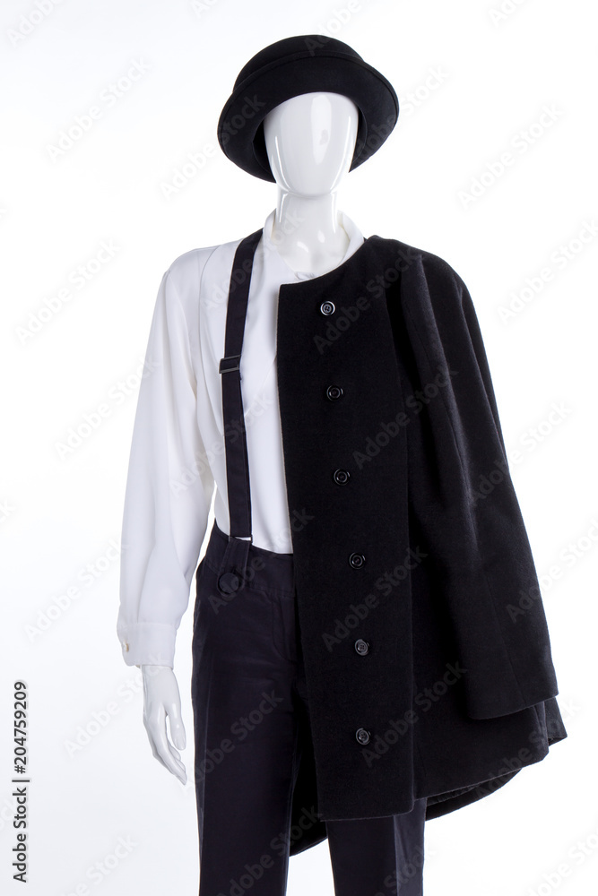 Black hat and overcoat for women. White blouse and black trousers with suspenders. Female classic apparel. Black hat and overcoat for women. White blouse and black trousers with suspenders. Female classic apparel.
