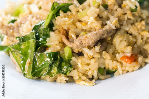 Thai food style , fried rice with pork on white background.Closed up