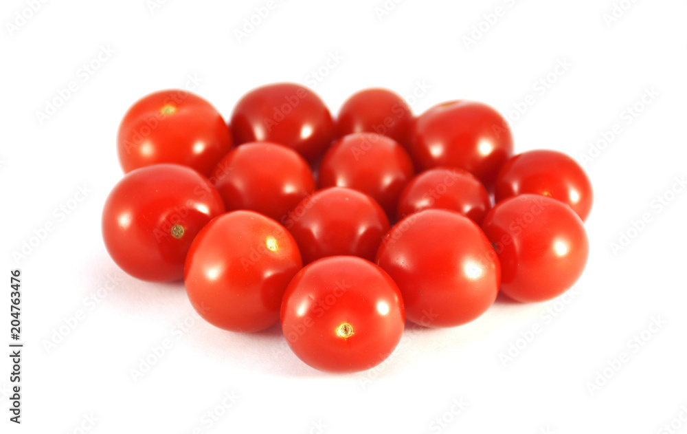 Red tomatoes on white background closeup Red tomatoes on white background closeup