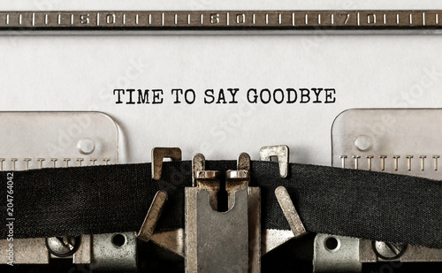 Text Time to Say Goodbye typed on retro typewriter photo