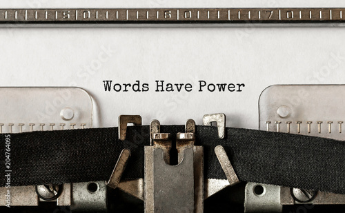 Text Words Have Power typed on retro typewriter photo