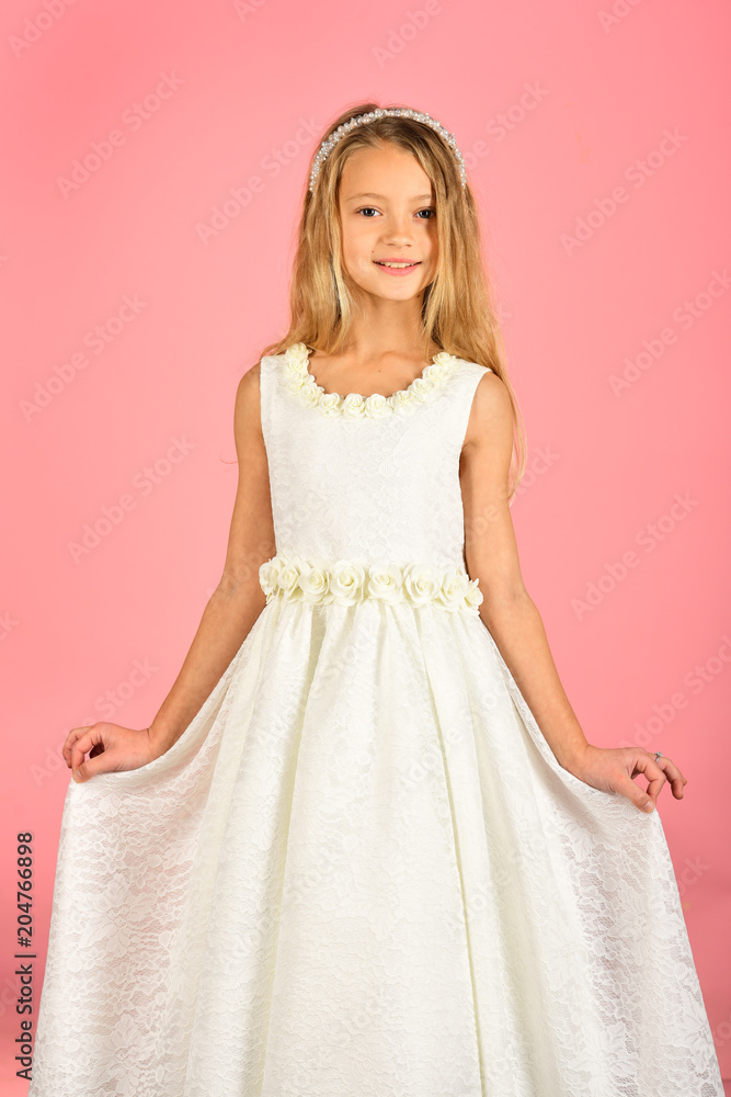 Child girl in stylish glamour dress, elegance. child in wedding white dress. Child girl in stylish glamour dress, elegance. child in wedding white dress.