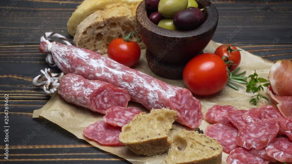 salami sausage close up on a wood board salami sausage close up on a wood board