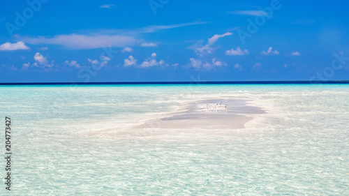 Tiny island ocean beach on Maldives