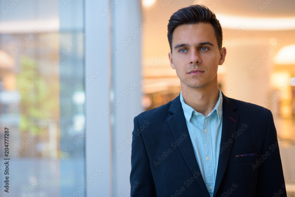 Young handsome businessman exploring the city Young handsome businessman exploring the city