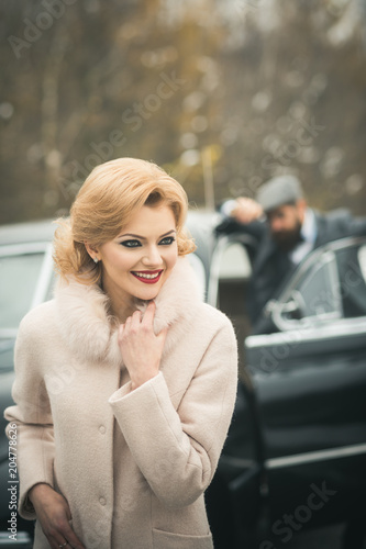 Retro couple in vintage car travelling together