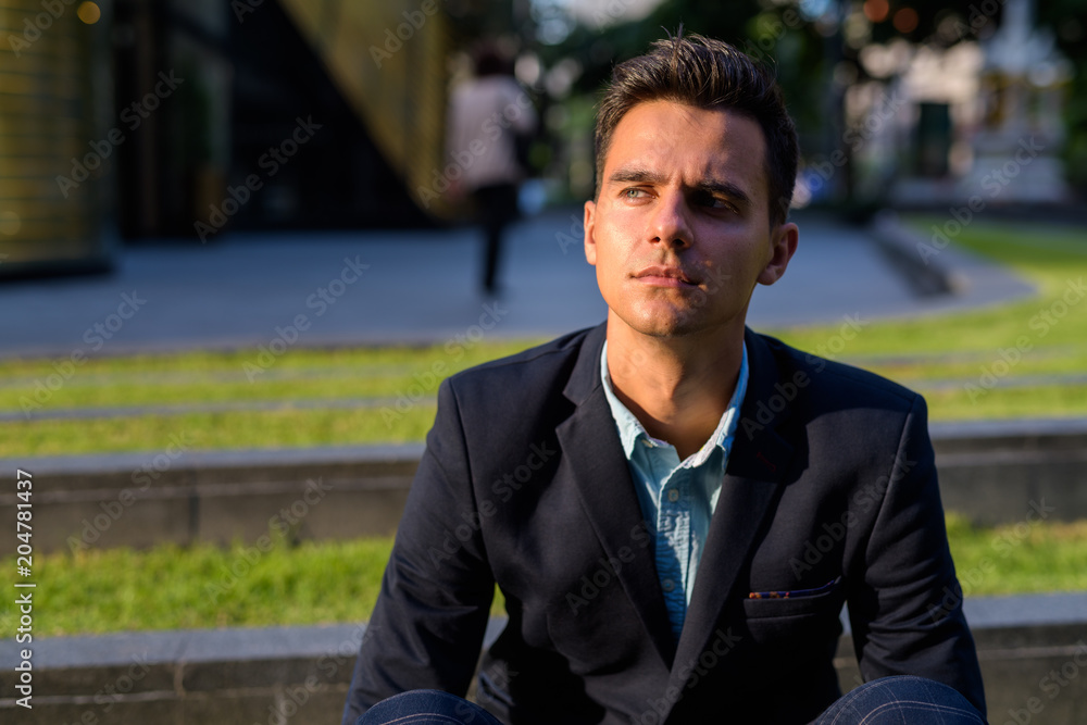 Young handsome businessman exploring the city Young handsome businessman exploring the city