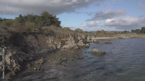Coast by Drone - 4K. Flat Color. Forest on Island in Bretagne. Travelling le long de la côte. Forêt sur une île. 