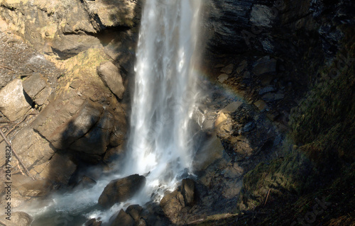 Rainbow in the Berschnerfall waterfalls above Berschis  Swiss Alps