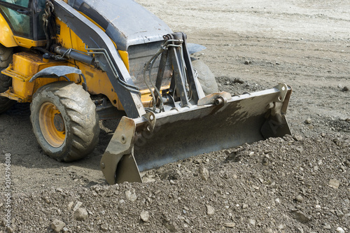 Construction machinery, bulldozer is working on the harvesting of gravel