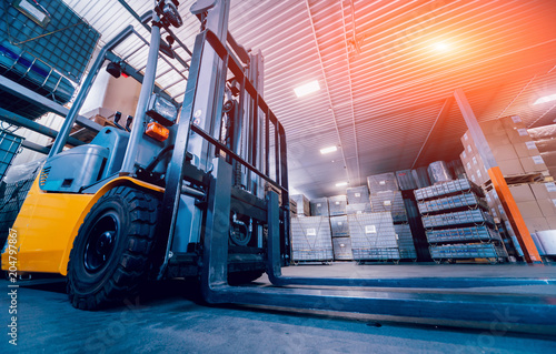 Obraz na płótnie Forklift loader. Pallet stacker truck equipment at warehouse