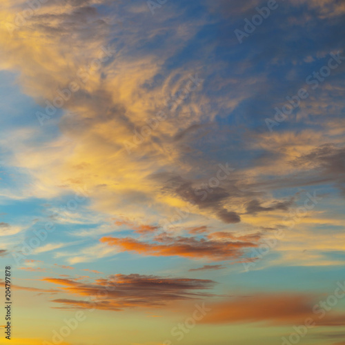 Blue sky and clouds at sunset  background