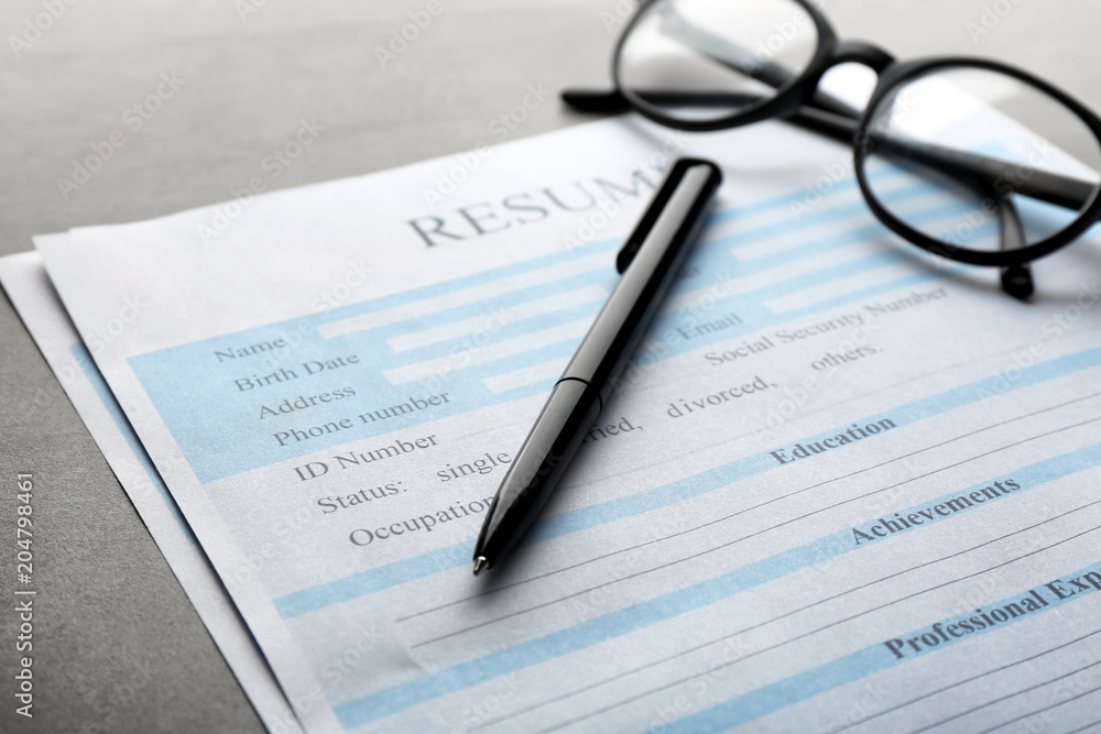 Resume forms and glasses on table, closeup. Job interview Resume forms and glasses on table, closeup. Job interview