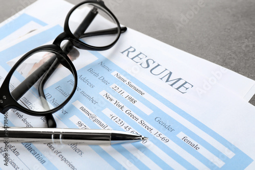 Resume forms and glasses on...