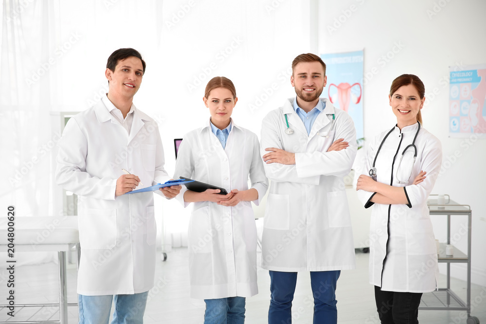 Young doctors wearing uniform in modern hospital. Gynecology department Young doctors wearing uniform in modern hospital. Gynecology department