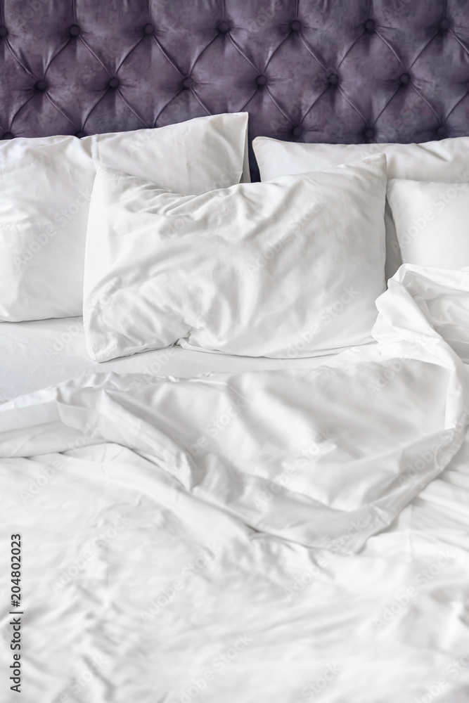 Comfortable bed with white linen at home Comfortable bed with white linen at home