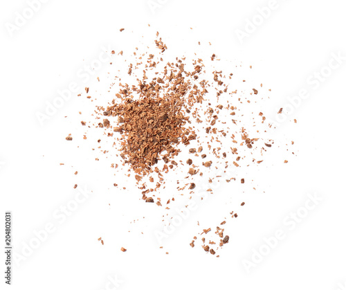 Delicious chocolate shavings on white background, top view