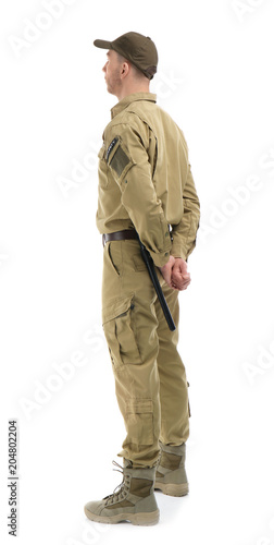 Male security guard in uniform on white background © New Africa