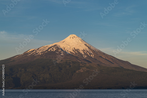 Beautiful sunset at a viewpoint in Ensenada located opposite the Osorno volcano, Puerto Varas, southern Chile