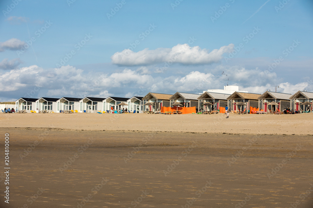  Row white beach houses at the Dutch coast in Katwijk, Netherlands