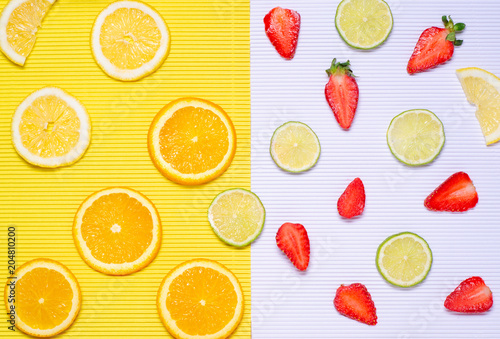 Fototapeta Naklejka Na Ścianę i Meble -  Orange lemon lime strawberry