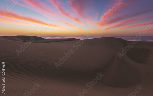 Famous natural park Maspalomas dunes in Gran Canaria at sunrise, Canary island, Spain