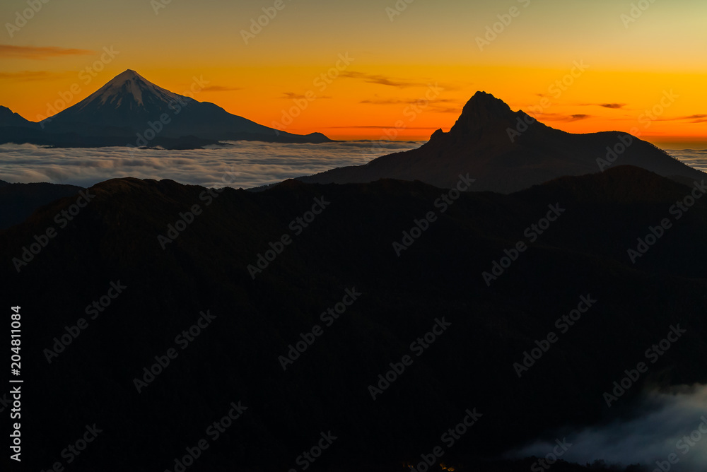 sunset landscape, on the heights of Antillanca Volcano, you can see a sea of clouds
