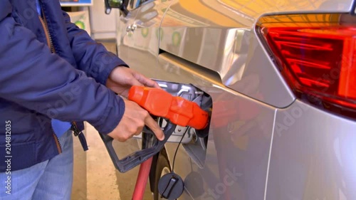 refueling a car with unleaded petrol photo