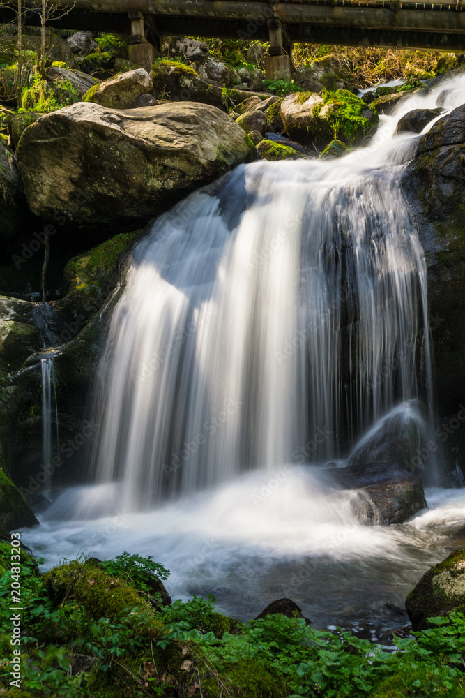 Germany, Sun shining on highest waterfalls of Germany in triberg in black forest Germany, Sun shining on highest waterfalls of Germany in triberg in black forest
