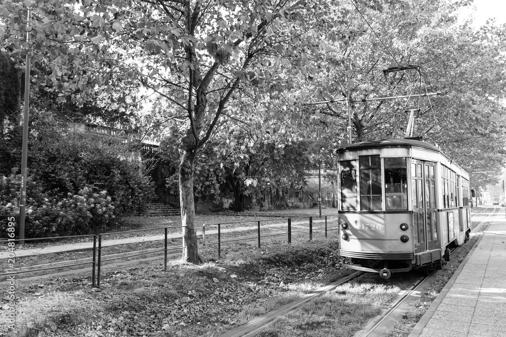 Tram in perspective from Milan. Autumn season.