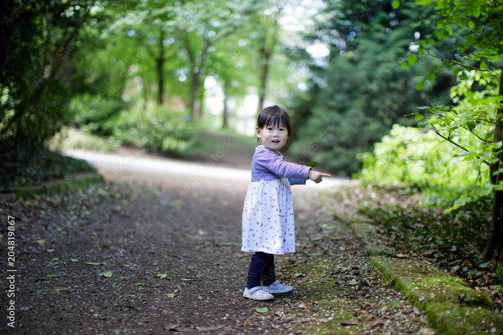 baby girl play at spring forest garden baby girl play at spring forest garden
