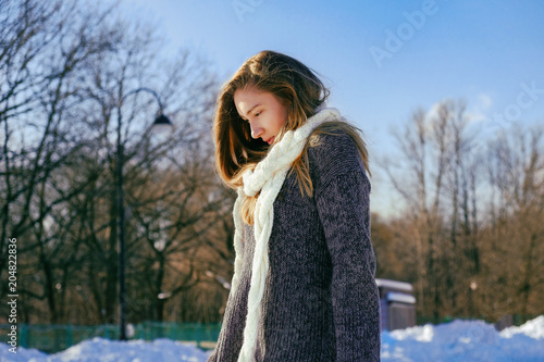 winter portrait of a young beautiful girl