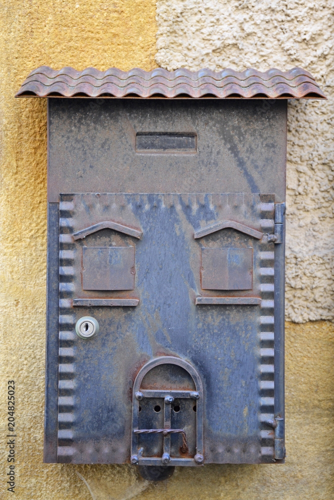 Old post box of a rustic house