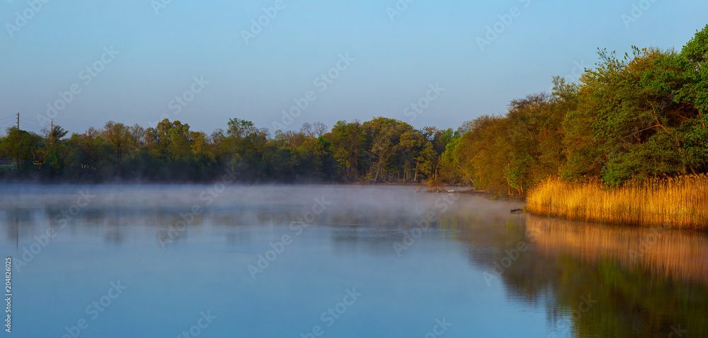 Misty morning on a small lake Foggy morning Misty morning on a small lake Foggy morning