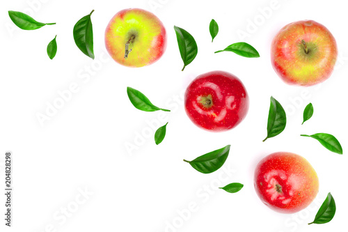 red apples decorated with green leaves isolated on white background with copy space for your text, top view