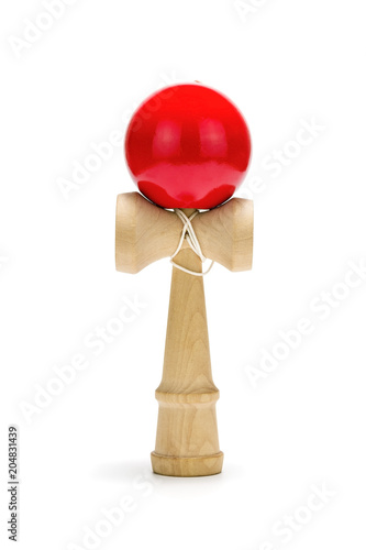 фотографія Kendama (vintage japanese toy) on white background