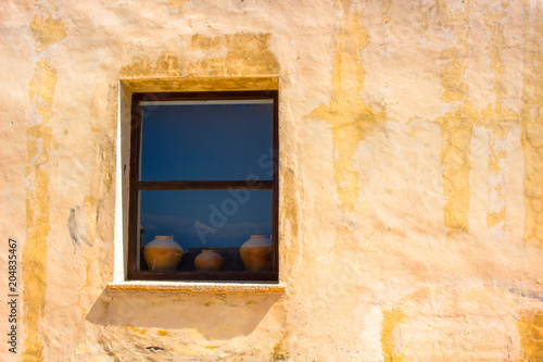 Window. The old window with three earthenware jugs. Cadiz  Andalusia  Spain.