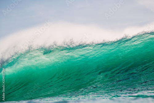 Breaking barrel wave in ocean. Breaking, big wave and sun light