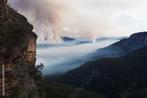 Australian mountain bushfire scene with cliffs and layers near Katoomba in the Blue Mountains National Park .