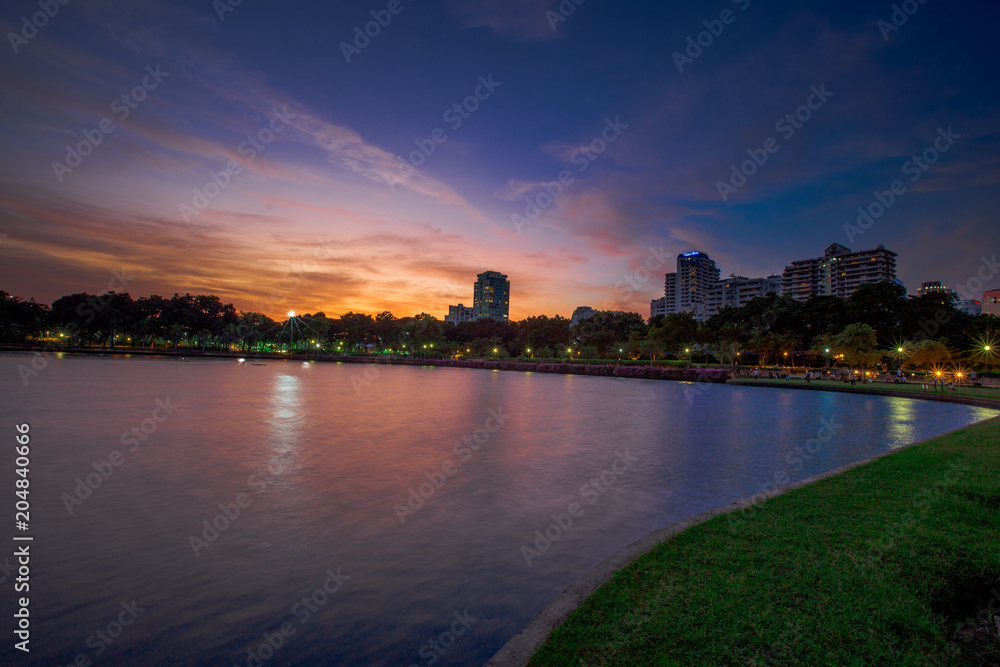 Twilight at the park in the heart of Bangkok. Evening People come to relax before going back to the residence (Benjakitti Park)