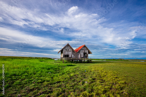 The twin houses have been abandoned for a long time. It is located between Ekachai, Miniature, Phatthalung. A place to visit while traveling. Keep up with lifestyle in Southern Thailand.