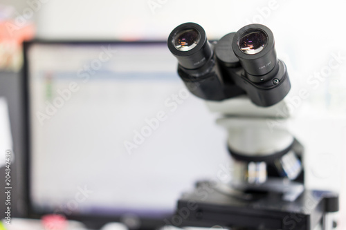 microscope in a science lab to find something special.