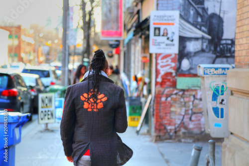 Photography TORONTO, CANADA-OCTOBER 16, 2016: Queen street, colorful people of Toronto enter