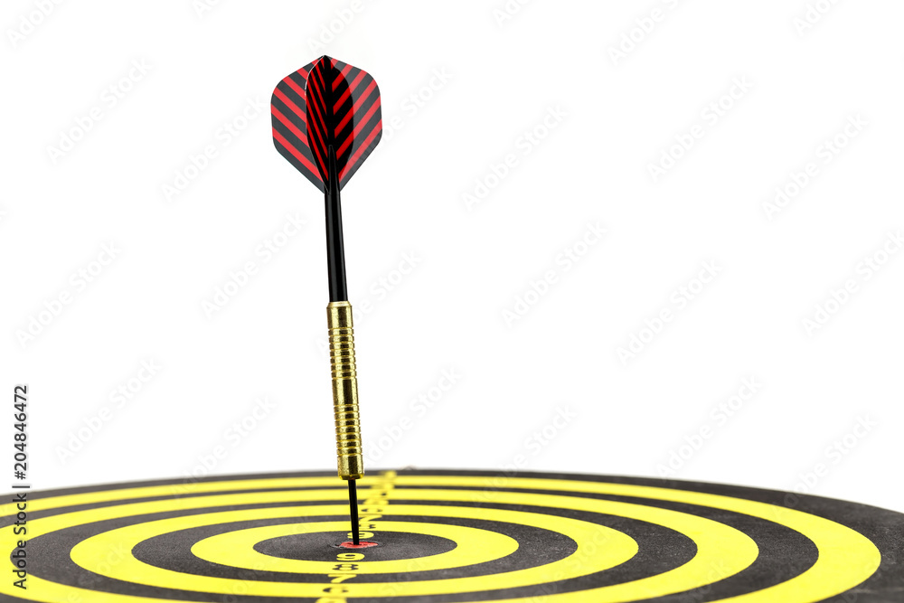 Close up shot dart arrow on center of dartboard, metaphor to target success Close up shot dart arrow on center of dartboard, metaphor to target success