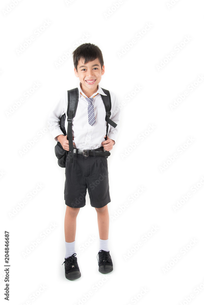 Little school boy wearing student uniform ready for first day school Little school boy wearing student uniform ready for first day school
