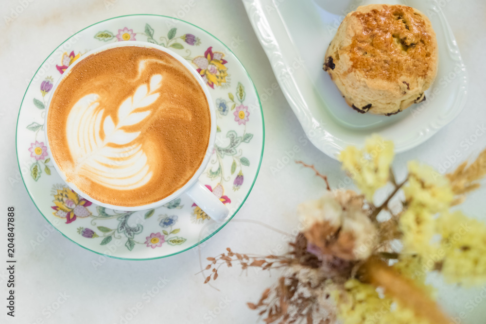 coffee break set with latte and scone coffee break set with latte and scone